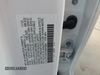 2024 Honda Pilot Touring с VIN 5FNYG2H76RB008887, выставлен на аукционе Copart как лот 46479745 с пробегом 12 947 миль миль и Списание • Salvage title. История ставок и продаж доступна на DreamBid. Изображение 13.