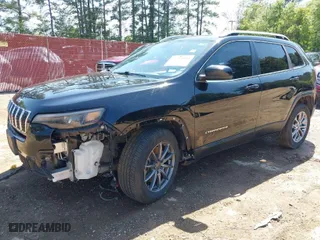 2019 Jeep Cherokee Latitude Plus with VIN 1C4PJLLBXKD123116, listed as a IAAI auction lot 41981044 with 173,232 mi miles. Bid and sale history available at carsss.com. Image 2.