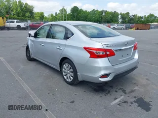 2019 Nissan Sentra S z VIN 3N1AB7AP6KY205658, wystawiony jako IAAI lot #42151392 z przebiegiem 80 395 mil mil oraz . Historia ofert i sprzedaży dostępna na DreamBid. Obrazek 3.