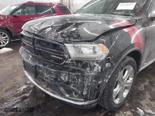2014 Dodge Durango Limited with VIN 1C4RDJDG5EC977844, listed as a IAAI auction lot 41558932 with 133,703 mi miles. Bid and sale history available at carsss.com. Image 6.