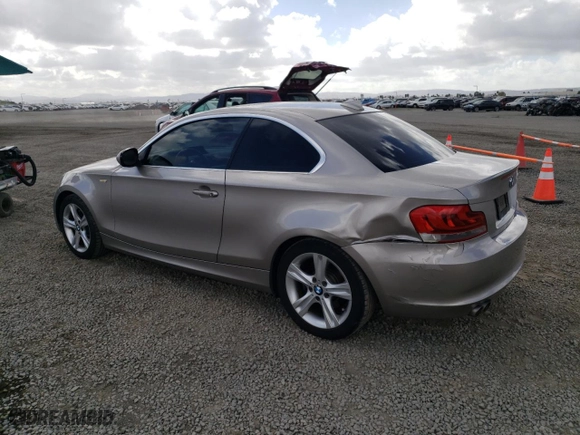 2013 BMW 1 Series 128i with VIN WBAUP9C59DVS94870, listed as a Copart auction lot 80990614 with 111,331 mi miles and Salvage Title. Bid and sale history available at carsss.com. Image 2.