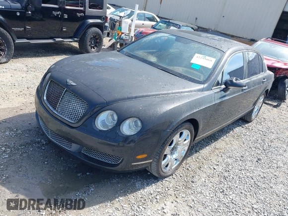2006 Bentley Flying Spur z VIN SCBBR53W06C039791, wystawiony jako IAAI lot #42295068 z przebiegiem 48 739 mil mil oraz . Historia ofert i sprzedaży dostępna na DreamBid. Obrazek 2.