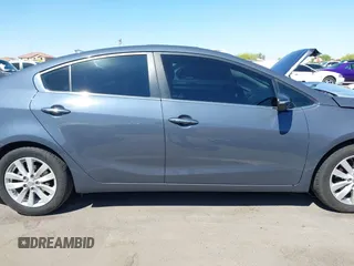 2014 Kia Forte EX with VIN KNAFX4A84E5112910, listed as a IAAI auction lot 42039761 with 118,126 mi miles. Bid and sale history available at carsss.com. Image 14.