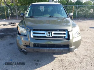 2006 Honda Pilot LX with VIN 5FNYF28156B040336, listed as a IAAI auction lot 42223190 with 158,686 mi miles and . Bid and sale history available at DreamBid. Image 6.