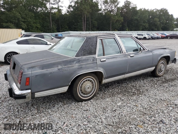 1985 Ford Crown Victoria z VIN 2FABP43F6FX102527, wystawiony jako Copart lot #71747574 z przebiegiem 50 249 mil mil oraz Nie do naprawy. Historia ofert i sprzedaży dostępna na DreamBid. Obrazek 3.