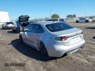 2021 Toyota Corolla SE with VIN 5YFS4MCE3MP060068, listed as a IAAI auction lot 41443006 with 49,856 mi miles. Bid and sale history available at carsss.com. Image 3.