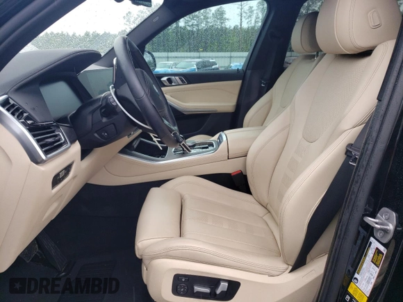 2022 BMW X5 xDrive40i with VIN 5UXCR6C06N9L83039, listed as a Copart auction lot 57109185 with 30,690 mi miles and Clean title. Bid and sale history available at DreamBid. Image 7.