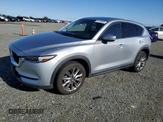 2021 Mazda CX-5 Grand Touring with VIN JM3KFBDM7M1388710, listed as a Copart auction lot 44185895 with 66,503 mi miles and Salvage Title. Bid and sale history available at carsss.com. Image 1.