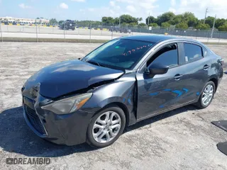 2018 Toyota Yaris iA with VIN 3MYDLBYV0JY333442, listed as a IAAI auction lot 41935391 with 98,124 mi miles. Bid and sale history available at carsss.com. Image 2.