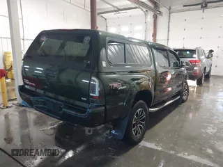 2012 Toyota Tacoma with VIN 3TMLU4EN2CM094154, listed as a IAAI auction lot 41322227 with 270,712 mi miles and . Bid and sale history available at DreamBid. Image 4.