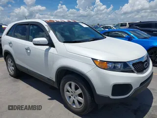 2013 Kia Sorento LX with VIN 5XYKTDA61DG397079, listed as a IAAI auction lot 42597484 with 127,648 mi miles and . Bid and sale history available at DreamBid. Image 1.
