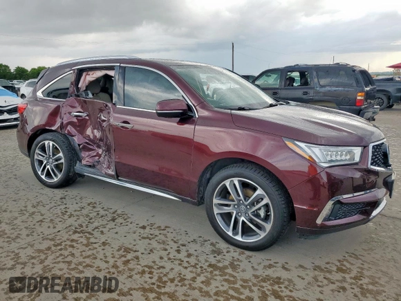 2017 Acura MDX Advance with VIN 5FRYD4H81HB015109, listed as a Copart auction lot 63743725 with 81,184 mi miles and Salvage title. Bid and sale history available at DreamBid. Image 4.