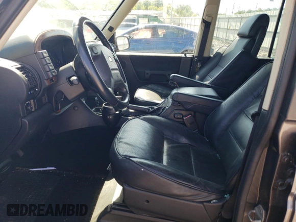 2003 Land Rover Discovery SE with VIN SALTW16433A821144, listed as a Copart auction lot 68110174 with 0 mi miles and Salvage Title. Bid and sale history available at carsss.com. Image 7.