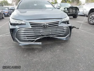2019 Toyota Avalon XLE with VIN 4T1BZ1FB3KU033885, listed as a IAAI auction lot 41774796 with 77,835 mi miles. Bid and sale history available at carsss.com. Image 6.