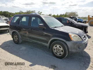 2005 Honda CR-V LX with VIN JHLRD68505C007344, listed as a Copart auction lot 54710305 with 148,976 mi miles and Salvage Title. Bid and sale history available at DreamBid. Image 4.