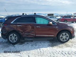 2022 Cadillac XT5 AWD Premium Luxury with VIN 1GYKNDRS9NZ128658, listed as a IAAI auction lot 41330193 with 34,361 mi miles and . Bid and sale history available at DreamBid. Image 14.