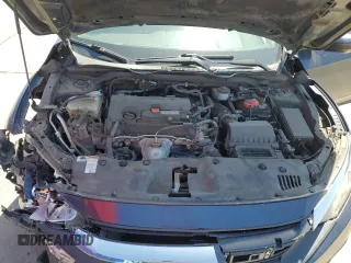 2017 Honda Civic LX z VIN 2HGFC2F55HH523474, wystawiony jako Copart lot #54933425 z przebiegiem 133 036 mil mil oraz Szkoda całkowita • Salvage title. Historia ofert i sprzedaży dostępna na DreamBid. Obrazek 11.