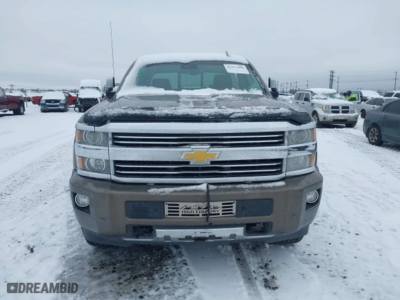 2015 Chevrolet Silverado 2500HD Built After Aug 14 High Country with VIN 1GC1KXE89FF543780, listed as a IAAI auction lot 41557608 with 164,171 mi miles. Bid and sale history available at carsss.com. Image 13.