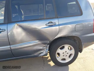 2006 Toyota Highlander w/3rd Row with VIN JTEEP21A560157211, listed as a IAAI auction lot 41879638 with 176,010 mi miles. Bid and sale history available at carsss.com. Image 6.