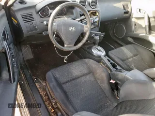 2007 Hyundai Tiburon GS z VIN KMHHM66D27U260421, wystawiony jako Copart lot #48982505 z przebiegiem 100 045 mil mil oraz Tytuł czysty. Historia ofert i sprzedaży dostępna na DreamBid. Obrazek 8.
