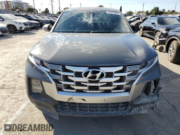 2022 Hyundai Santa Cruz SEL z VIN 5NTJBDAE2NH015174, wystawiony jako Copart lot #56071745 z przebiegiem 19 407 mil mil oraz Szkoda całkowita • Salvage title. Historia ofert i sprzedaży dostępna na DreamBid. Obrazek 5.