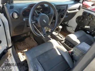 2008 Jeep Wrangler X with VIN 1J4FA24108L642938, listed as a Copart auction lot 55653525 with 119,424 mi miles and Salvage title. Bid and sale history available at DreamBid. Image 8.