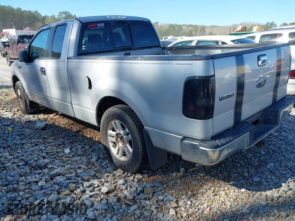 2005 Ford F-150 STX with VIN 1FTRX12W95NB42772, listed as a IAAI auction lot 41826733 with 224,266 mi miles. Bid and sale history available at carsss.com. Image 3.