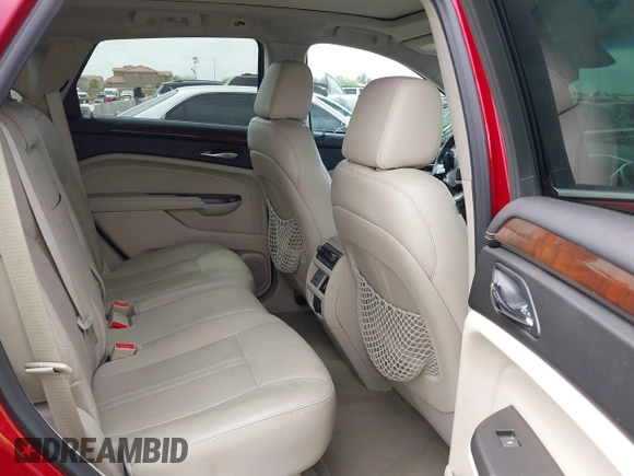2012 Cadillac SRX Premium Collection with VIN 3GYFNCE3XCS610463, listed as a IAAI auction lot 41911167 with 148,118 mi miles and . Bid and sale history available at DreamBid. Image 8.
