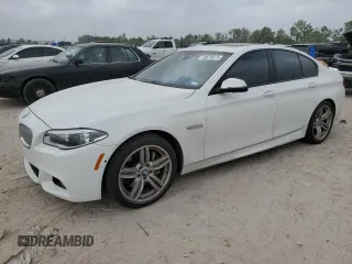 2016 BMW 5 Series 550i with VIN WBAKN9C55GD962185, listed as a Copart auction lot 50878875 with 75,342 mi miles and Clean title. Bid and sale history available at DreamBid. Image 1.