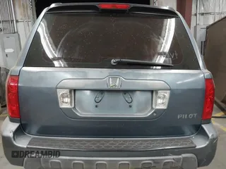 2005 Honda Pilot LX z VIN 2HKYF18135H537704, wystawiony jako IAAI lot #41091540 z przebiegiem Nie podano mil oraz . Historia ofert i sprzedaży dostępna na DreamBid. Obrazek 17.