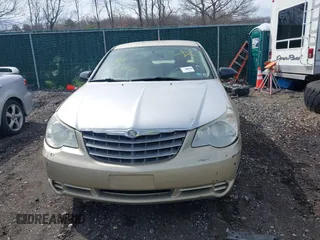 2010 Chrysler Sebring Touring z VIN 1C3CC4FB8AN187095, wystawiony jako IAAI lot #42032541 z przebiegiem 189 971 mil mil oraz . Historia ofert i sprzedaży dostępna na DreamBid. Obrazek 6.