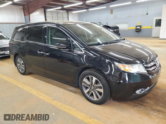 2015 Honda Odyssey Touring Elite with VIN 5FNRL5H99FB005576, listed as a Copart auction lot 58963215 with 167,967 mi miles and Salvage title. Bid and sale history available at DreamBid. Image 4.
