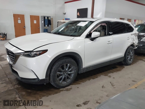 2020 Mazda CX-9 Touring z VIN JM3TCBCY8L0405360, wystawiony jako IAAI lot #41419428 z przebiegiem 69 917 mil mil oraz . Historia ofert i sprzedaży dostępna na DreamBid. Obrazek 2.