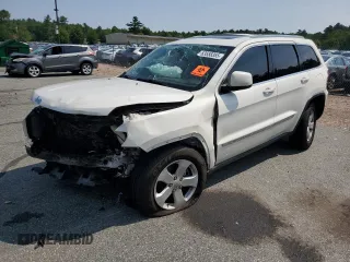 2011 Jeep Grand Cherokee Laredo with VIN 1J4RR4GG6BC657520, listed as a Copart auction lot 63558355 with 215,444 mi miles and Salvage title. Bid and sale history available at DreamBid. Image 1.