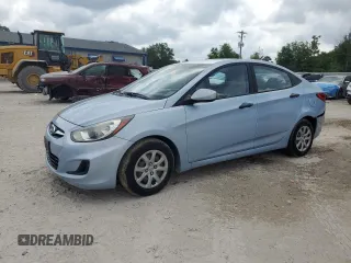 2012 Hyundai Accent GLS with VIN KMHCT4AEXCU037989, listed as a Copart auction lot 53439415 with 102,948 mi miles and Salvage Title. Bid and sale history available at carsss.com. Image 1.