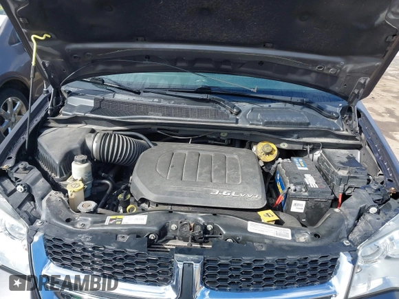 2015 Dodge Grand Caravan SXT with VIN 2C4RDGCG8FR541373, listed as a IAAI auction lot 41990500 with 114,100 mi miles and . Bid and sale history available at DreamBid. Image 10.