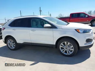 2024 Ford Edge Titanium z VIN 2FMPK4K98RBA75080, wystawiony jako IAAI lot #41843758 z przebiegiem 8687 mil mil oraz . Historia ofert i sprzedaży dostępna na DreamBid. Obrazek 13.