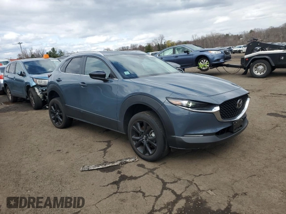 2023 Mazda CX-30 S Carbon Edition with VIN 3MVDMBCM7PM569904, listed as a Copart auction lot 52280755 with 18,963 mi miles and Salvage title. Bid and sale history available at DreamBid. Image 4.