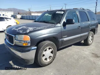 2005 GMC Yukon SLT with VIN 1GKEC13T25J159049, listed as a Copart auction lot 42167865 with 194,223 mi miles and Salvage Title. Bid and sale history available at carsss.com. Image 1.