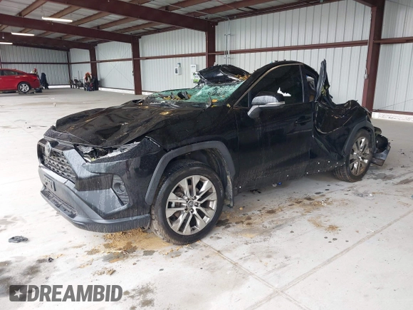 2021 Toyota RAV4 XLE Premium z VIN 2T3A1RFV0MW145999, wystawiony jako IAAI lot #42234472 z przebiegiem 57 424 mil mil oraz . Historia ofert i sprzedaży dostępna na DreamBid. Obrazek 2.