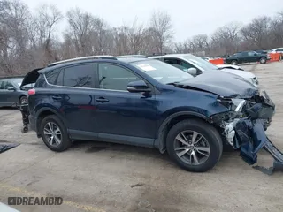 2017 Toyota RAV4 XLE with VIN JTMRFREV6HJ137349, listed as a IAAI auction lot 41542599 with 60,868 mi miles. Bid and sale history available at carsss.com. Image 13.