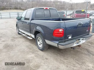 2003 Ford F-150 XLT with VIN 1FTRW07L63KD51221, listed as a IAAI auction lot 41883942 with Not Provided miles. Bid and sale history available at carsss.com. Image 3.
