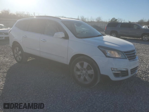 2015 Chevrolet Traverse LTZ with VIN 1GNKVJKD5FJ248402, listed as a Copart auction lot 47138305 with 140,808 mi miles and Salvage Title. Bid and sale history available at DreamBid. Image 4.