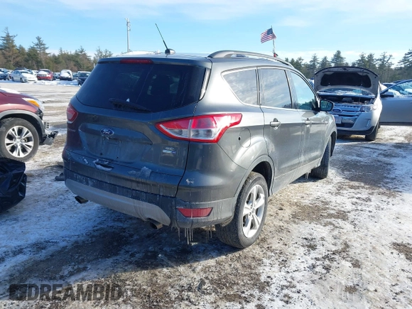 2016 Ford Escape SE with VIN 1FMCU9GX1GUC32307, listed as a IAAI auction lot 41395399 with 142,664 mi miles. Bid and sale history available at carsss.com. Image 4.