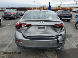2014 Mazda 3 S Touring with VIN JM1BM1V31E1107453, listed as a Copart auction lot 48769215 with 145,346 mi miles and Salvage Title. Bid and sale history available at DreamBid. Image 6.