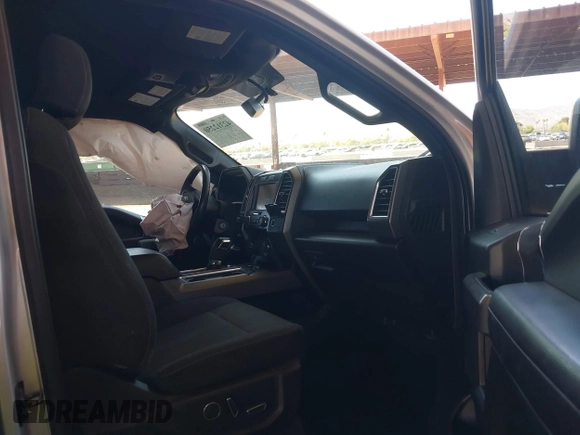 2015 Ford F-150 XLT with VIN 1FTEW1EF6FKD10853, listed as a IAAI auction lot 42312250 with 103,643 mi miles and . Bid and sale history available at DreamBid. Image 5.