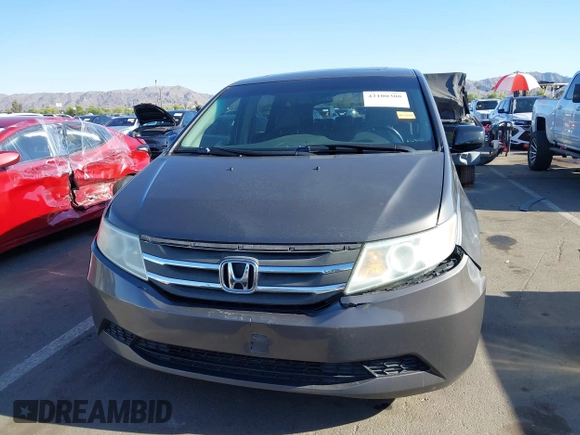 2011 Honda Odyssey EX-L with VIN 5FNRL5H6XBB083980, listed as a IAAI auction lot 42100308 with 191,361 mi miles and . Bid and sale history available at carsss.com. Image 12.
