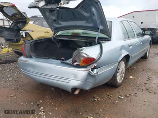 2009 Mercury Grand Marquis LS with VIN 2MEHM75V99X618418, listed as a IAAI auction lot 41104998 with 72,658 mi miles. Bid and sale history available at carsss.com. Image 4.