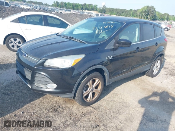 2013 Ford Escape SE with VIN 1FMCU9GX1DUC40662, listed as a IAAI auction lot 42158818 with 115,953 mi miles and . Bid and sale history available at DreamBid. Image 2.