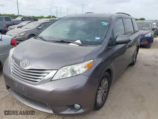 2016 Toyota Sienna XLE with VIN 5TDYK3DC6GS691853, listed as a IAAI auction lot 42058866 with 158,073 mi miles. Bid and sale history available at carsss.com. Image 2.